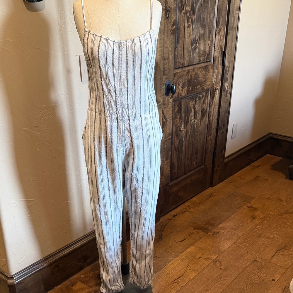 l*space Cream Jumpsuit with Black Vertical Stripes